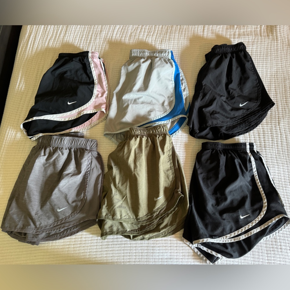 6 pairs of Nike running shorts size large